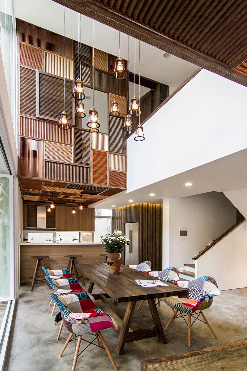 A Patchwork Of Wood Shutters Cover The Wall And Ceiling In