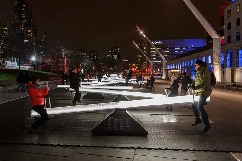 People In Montreal Are Playing On Light-Filled Seesaws This Winter