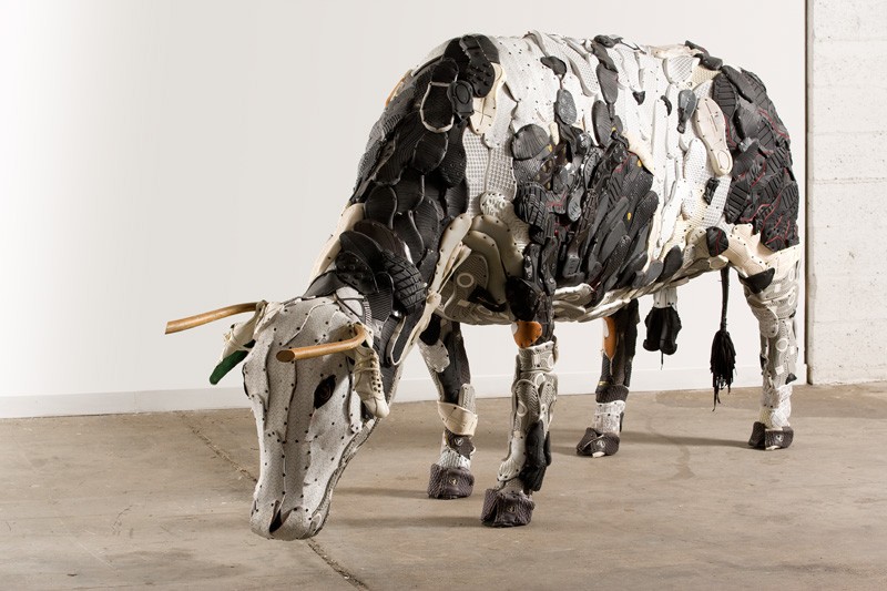 This artist made a collection of farm animal sculptures from unconventional  materials like shoes, mops, and leather bags