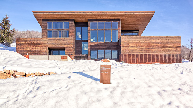 A new wood clad home sits on the mountainside in Park City, Utah