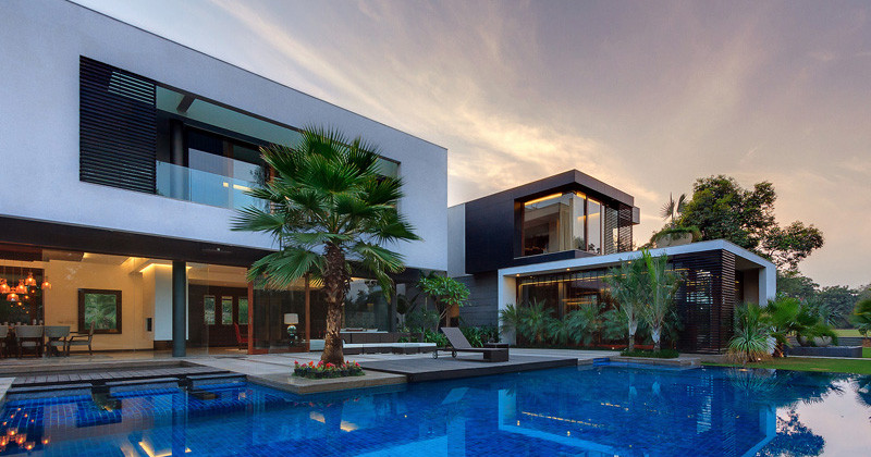 This Home Was Designed To Wrap Around The Swimming Pool
