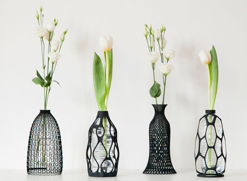 These sculptural vases are designed to use an old plastic bottle inside them