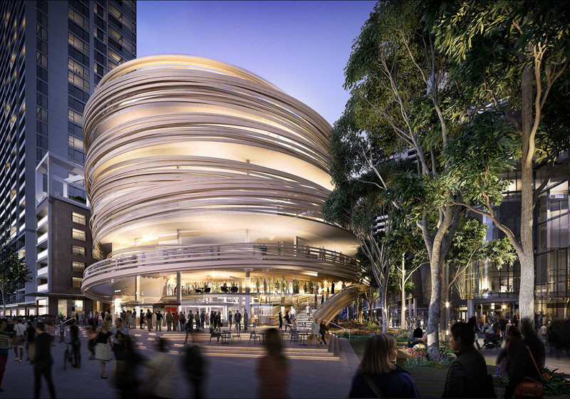 This circular building surrounded by strips of wood will be a new library for Sydney