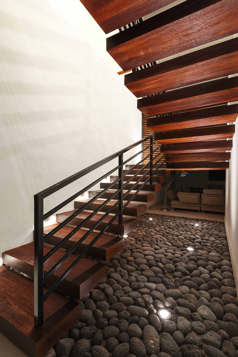 Rich dark wood and metal stairs