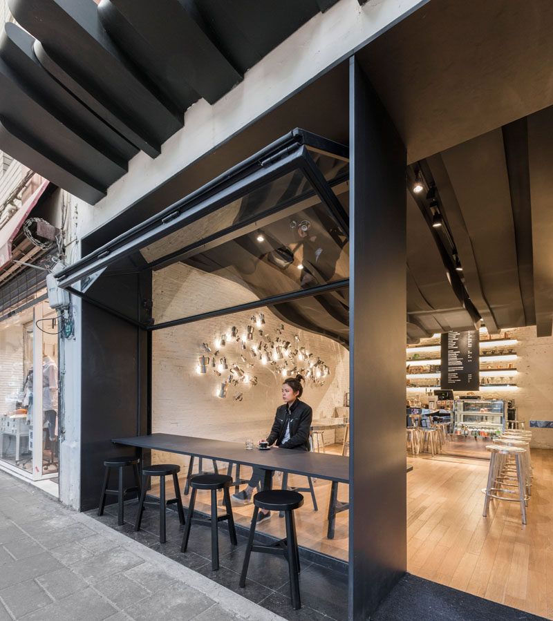 The Sculptural Ceiling In This Cafe Continues From The Inside To The Outside
