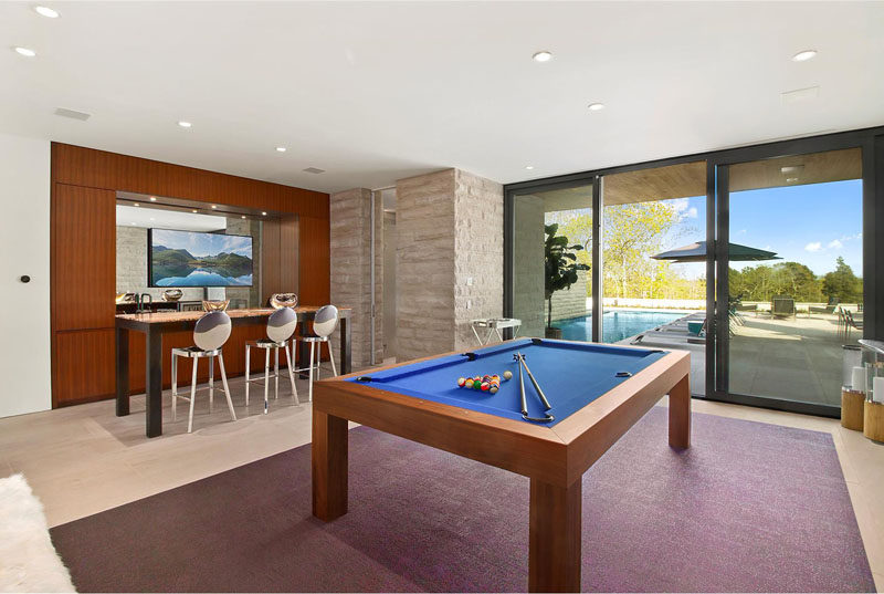 This games room and bar area are located just off the swimming pool, making it perfect for entertaining.
