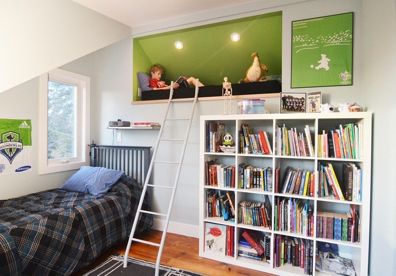 11 Kids Only Hideouts That Even The Biggest Grownups Would Be Jealous Of // This boys bedroom includes reading loft with comfy furnishings.