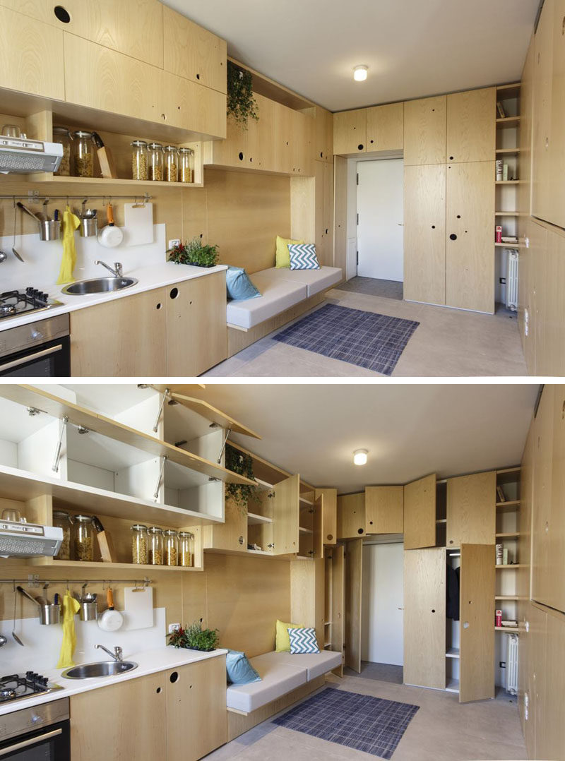 This tiny apartment has the lounge and kitchen sharing the space, with lots of cabinetry for storage.