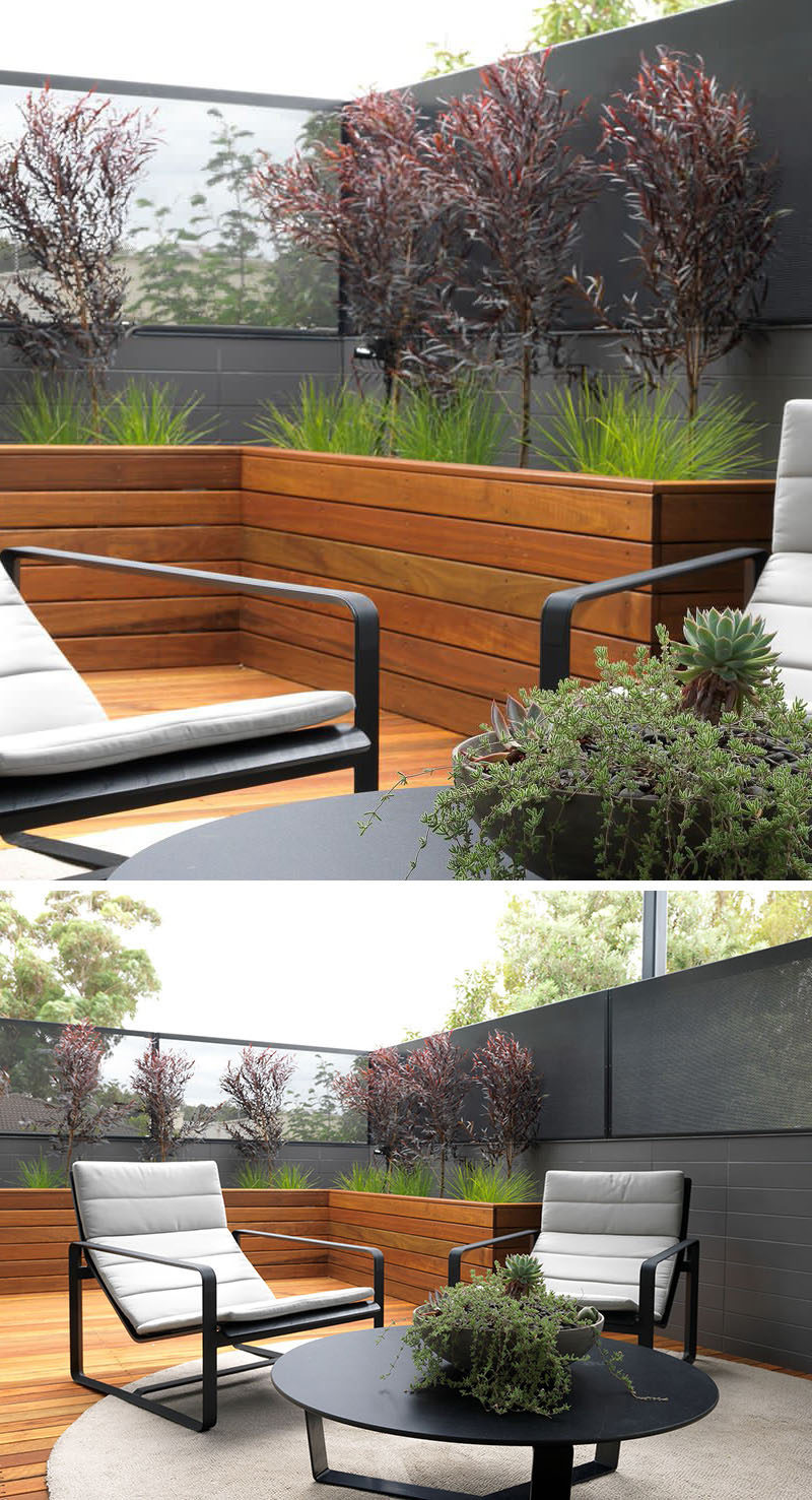 12 Ideas For Including Built-In Wooden Planters In Your Outdoor Space // These large wood planters create a space for greenery, and as the plants grow, will contribute to making the patio more private as well.
