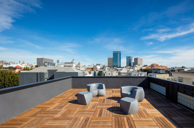 This rooftop has wooden flooring and views of San Francisco.