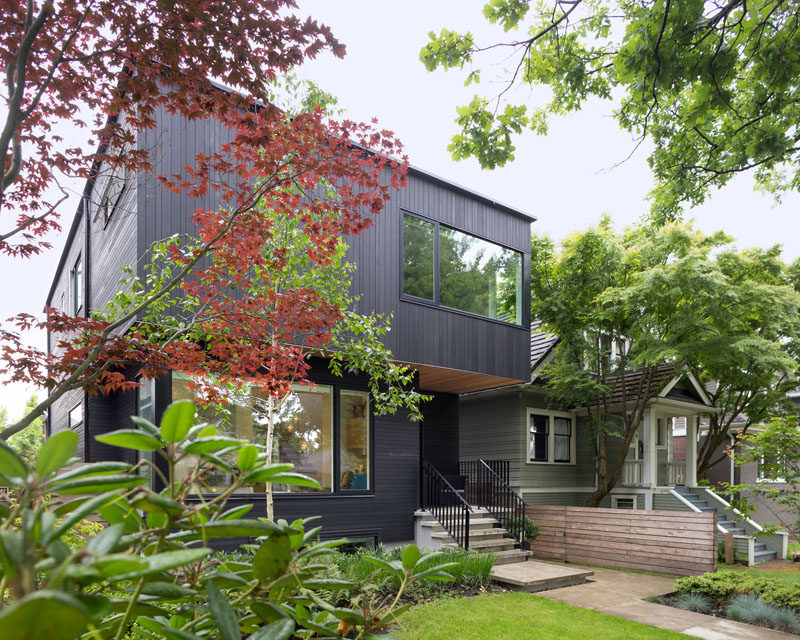 This contemporary home with black cladding can be found in Vancouver, Canada.