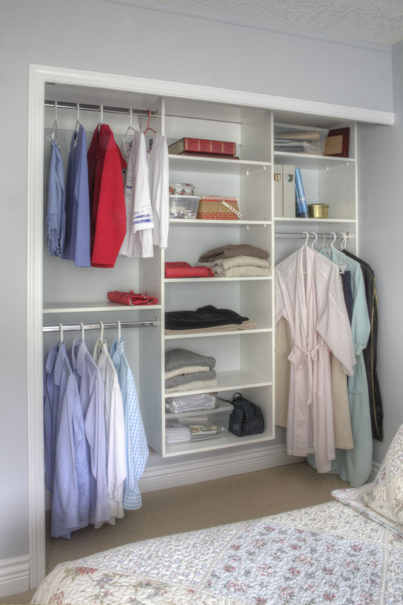 9 Storage Ideas For Small Closets // Having rods at different heights allows you hang more of your clothes, allowing you to fit more in, and keeps them more visible than if they were kept in drawers.