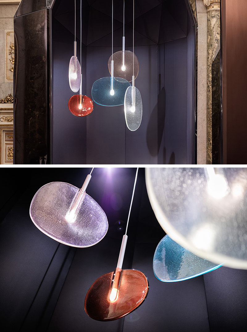 The Lollipop Collection, made up of a floor lamp, table lamp and pendant lamps, has been designed as a playful reminder of what it is like to look through a glass bottle into the sun, or when you hold a lollipop up to the light.