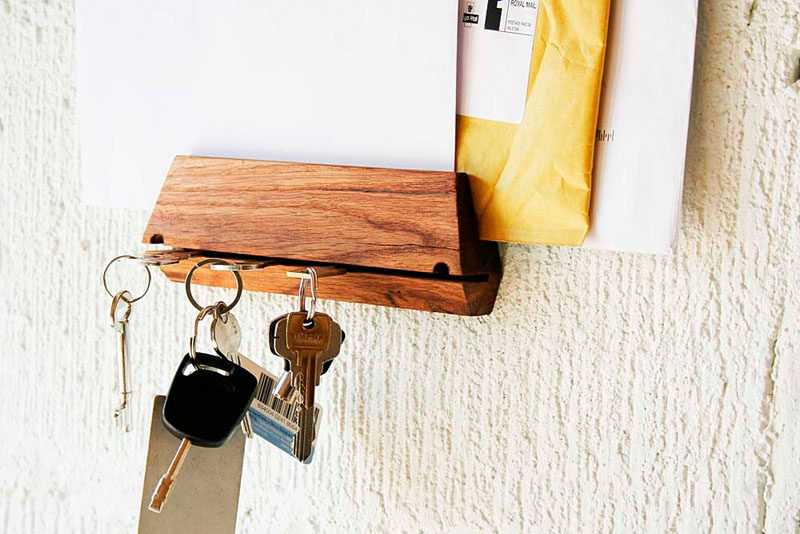16 Key Holders To Keep You Organized // A thin cut in this wood block is just big enough to tuck a key into and has a mail slot perfect for helping you stay organized.