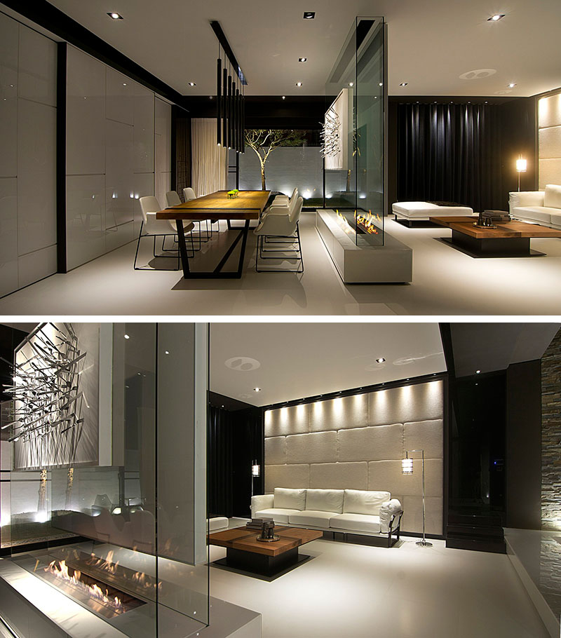 Room Divider Idea - This glass wall supports a TV, an art piece, and