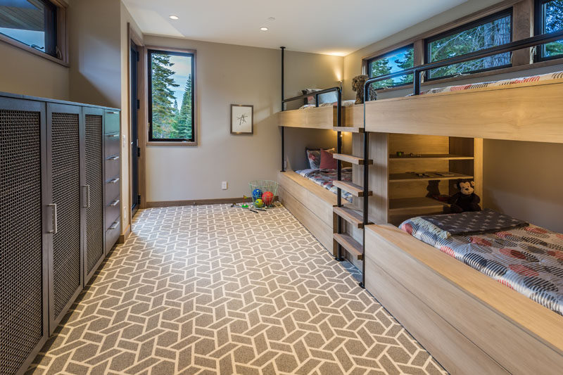 This kids room has been set up with built-in bunk beds (to sleep four) and plenty of storage.