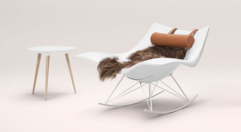 Furniture Ideas - 14 Awesome Modern Rocking Chair Designs // The polypropylene body of this rocking chair can warmed up by a soft lambskin and comfortable neck pillow.