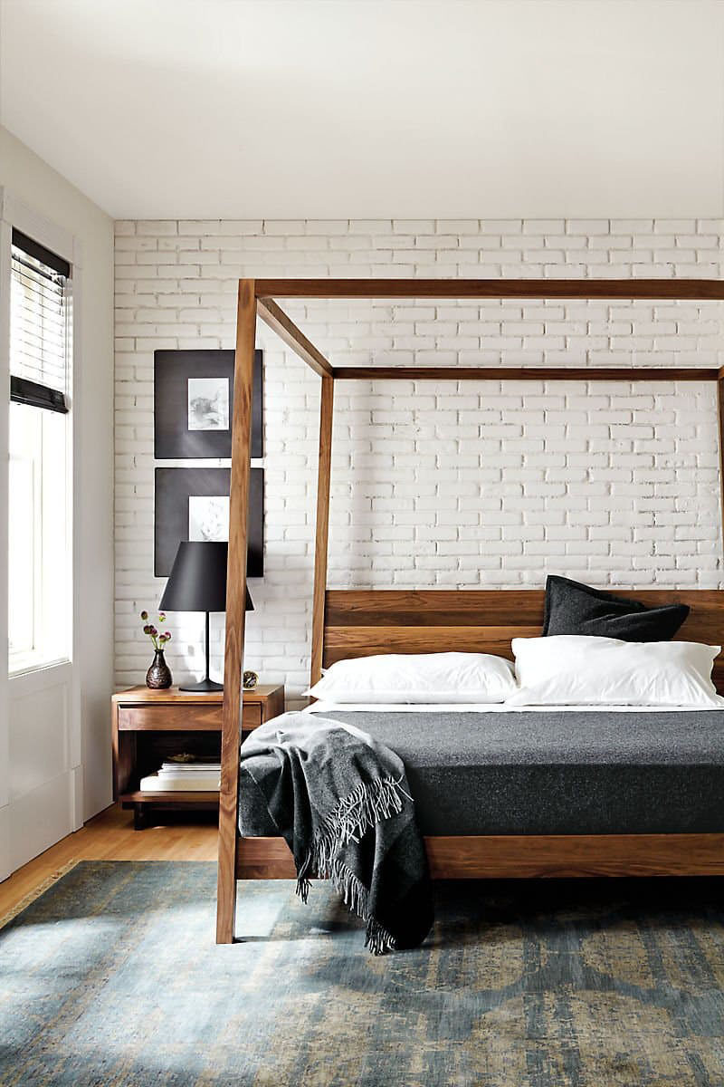Bedroom Design Idea - 7 Ways To Create A Warm And Cozy Bedroom // Use a wooden bed frame to add warmth to a room.