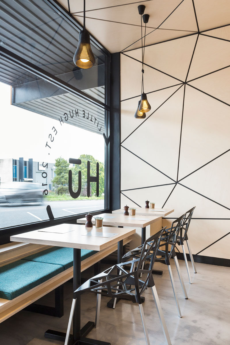 The interior of this cafe is covered in geometric panel shapes