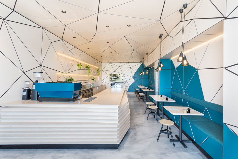 The interior of this cafe is covered in geometric panel shapes