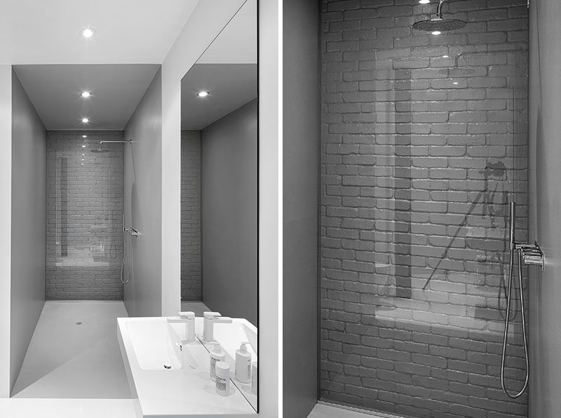 Bathroom Design Idea ? Use Glass To Cover An Original Brick Wall And Make It A Feature