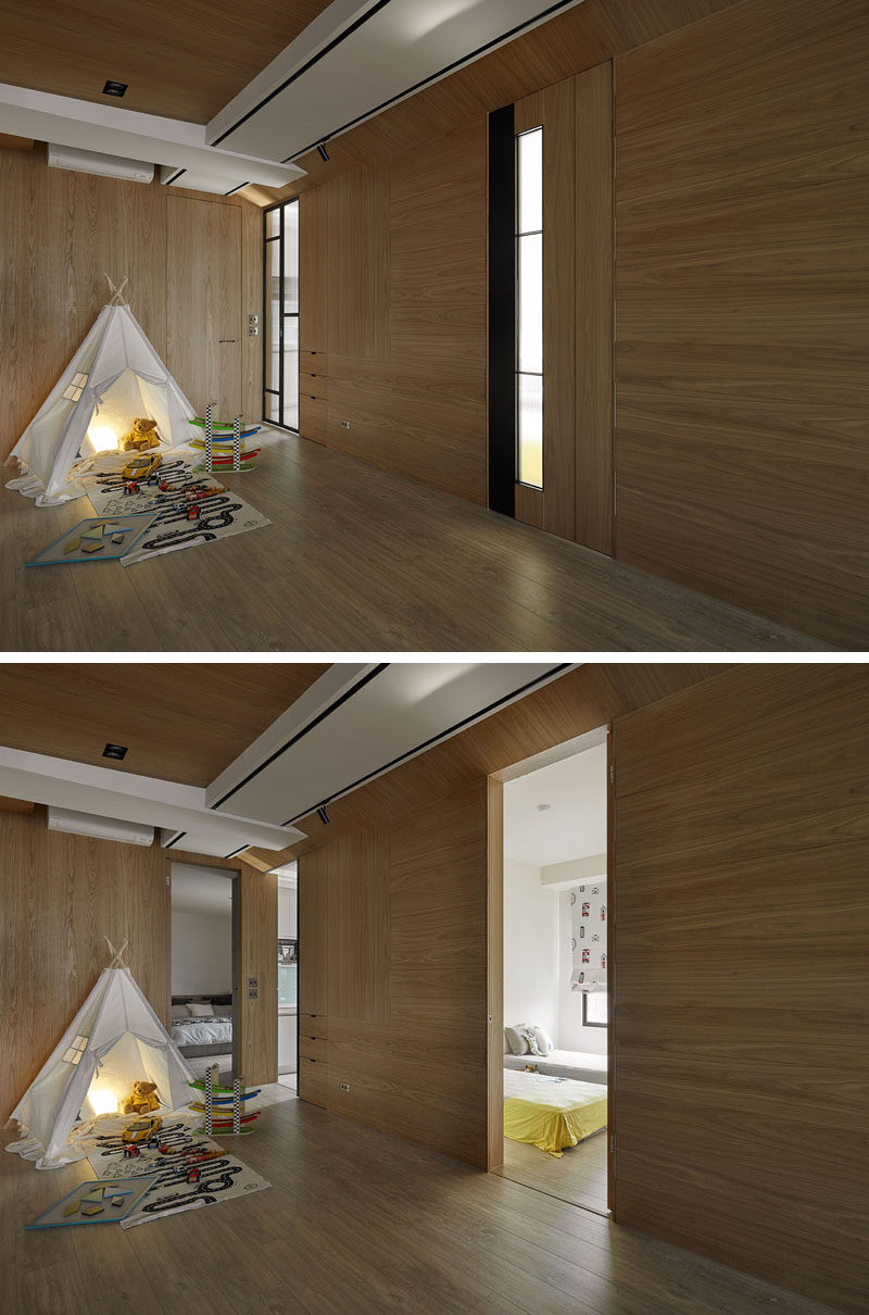 In this apartment and off to the side of the play area, there are somewhat hidden doors that when open reveal the master bedroom on the left, the kitchen in the middle and the children's bedroom on the right.