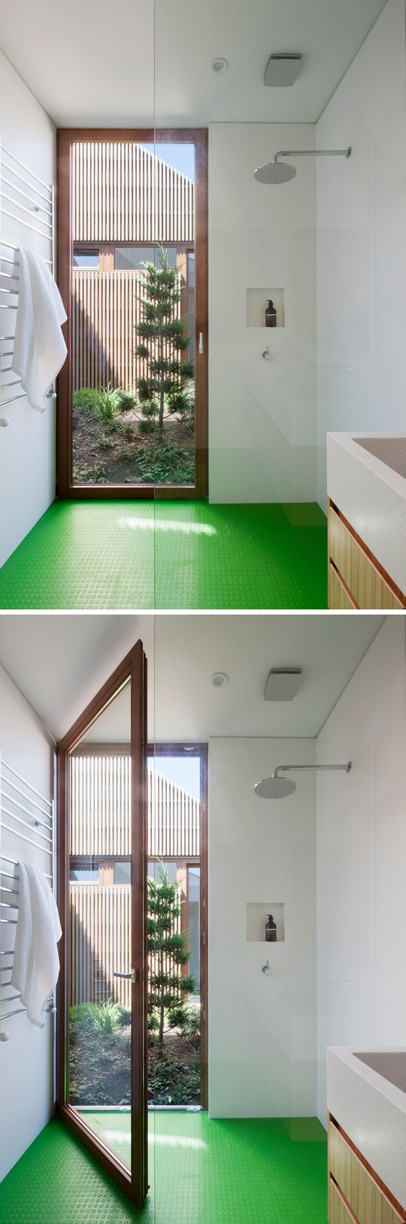 In this modern bathroom, there's bright green flooring and built-in shelving in the shower, and a floor-to-ceiling wood framed door that opens off the shower into the courtyard just outside.