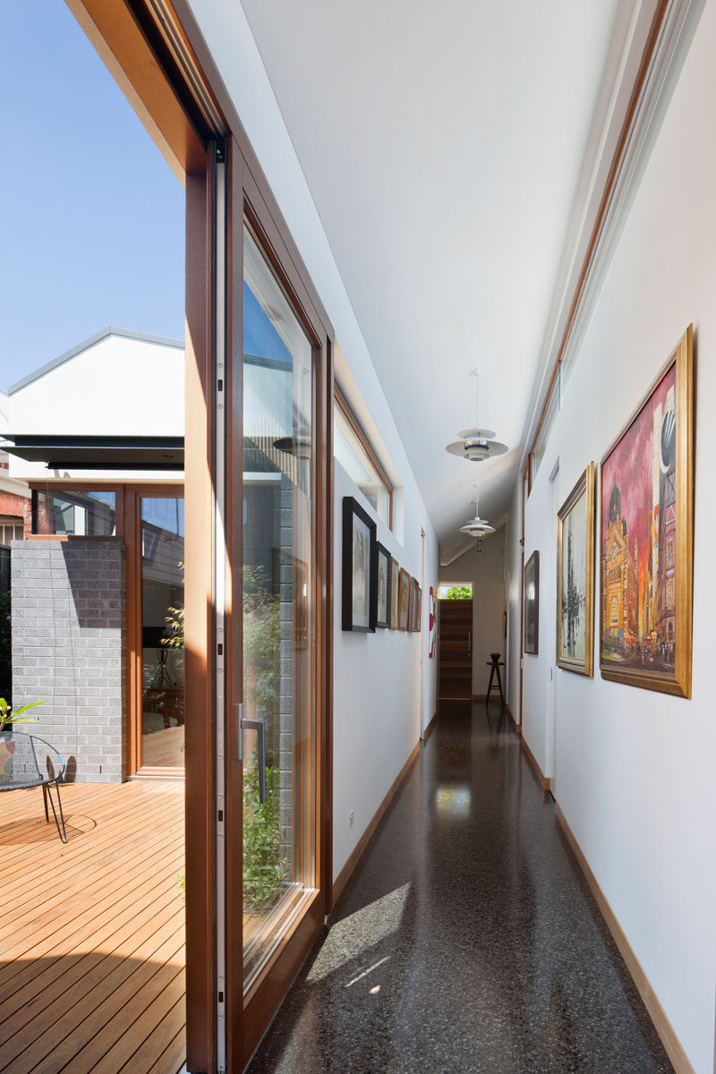 This hallway has a sliding door that provides access to an internal courtyard.