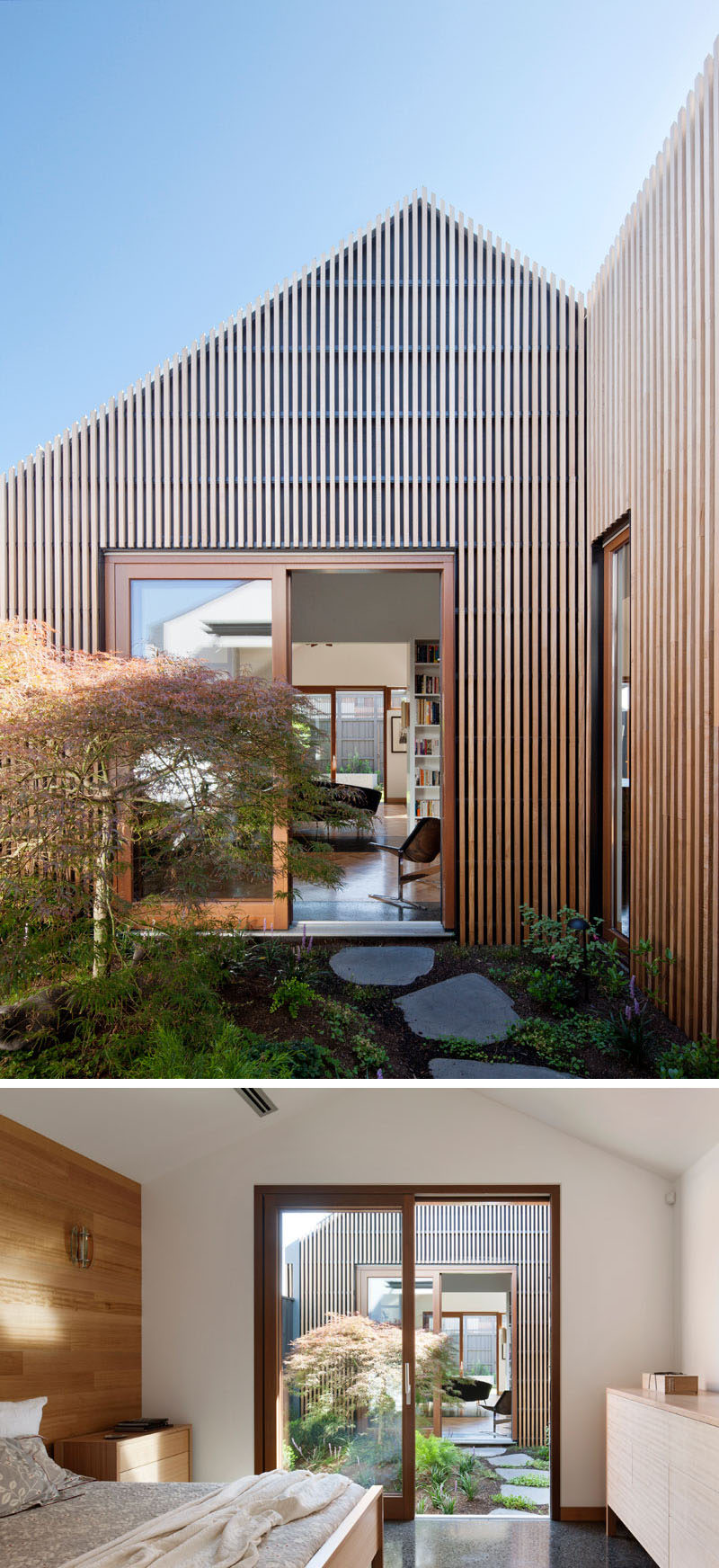 In this modern bedroom, a wood paneled feature wall behind the bed adds a natural touch to the room and unites the other wood details, like the frame around the sliding glass door. The sliding glass door opens up into a small bright courtyard with a stone path that leads into the library.