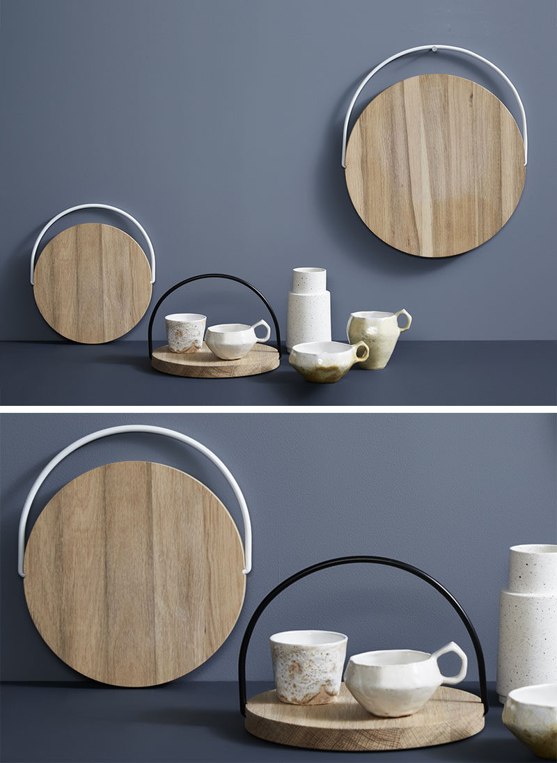 These circular wood trays feature movable handles that allow them to be hung up easily and transported from one place to another effortlessly.
