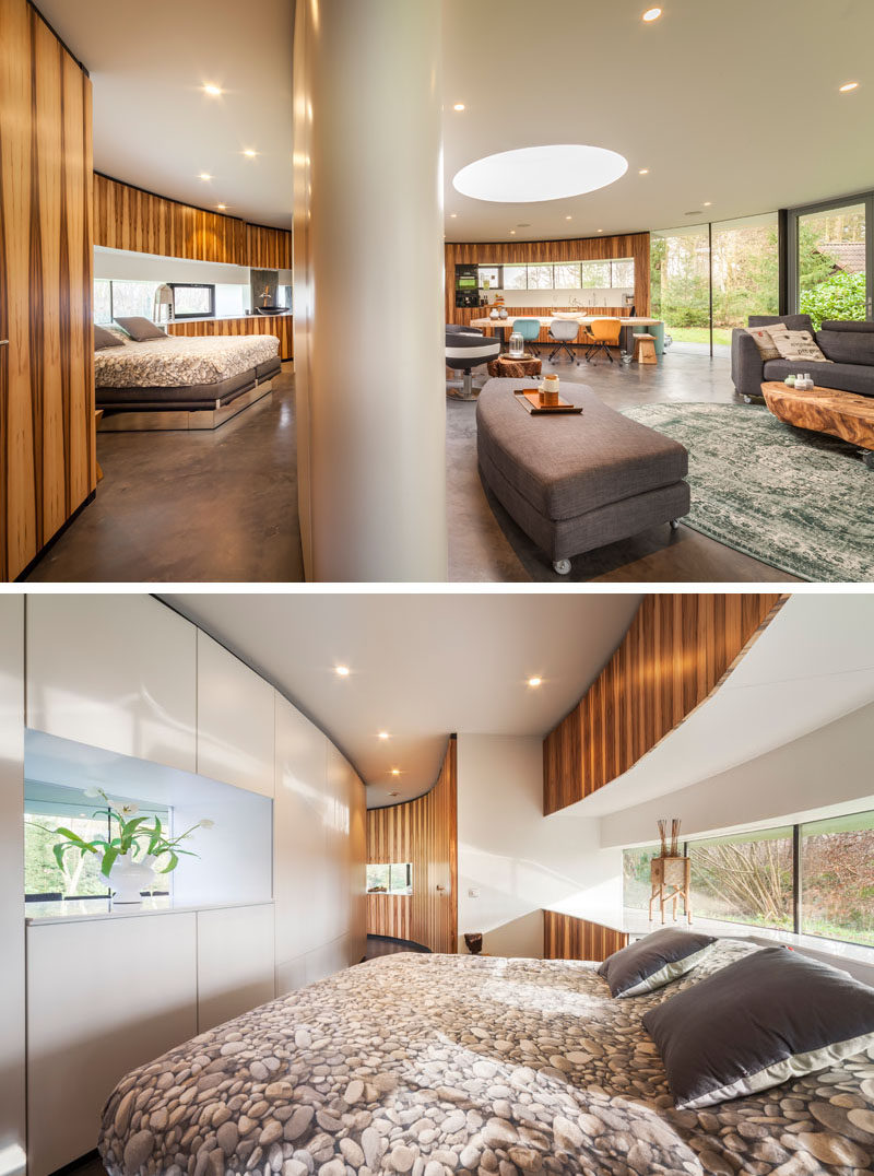 Although the design of this modern house means that the bedroom is connected to the rest of the interior, a sliding hatch can be closed to separate the bedroom and the rest of the home and provide a little bit of privacy.