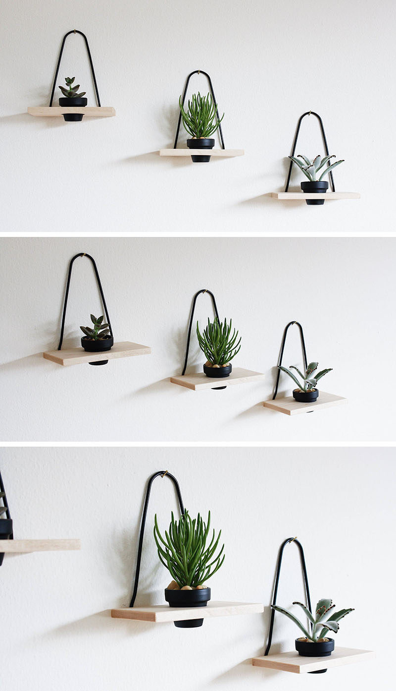 Add a minimalist touch to your interior and brighten it up with a few small plants potted in these wood and black metal mini wall planters, that are hung with a single hook. #WallMountedPlanters #WallPlanters #Decor #HomeDecor #Plants #Gardening
