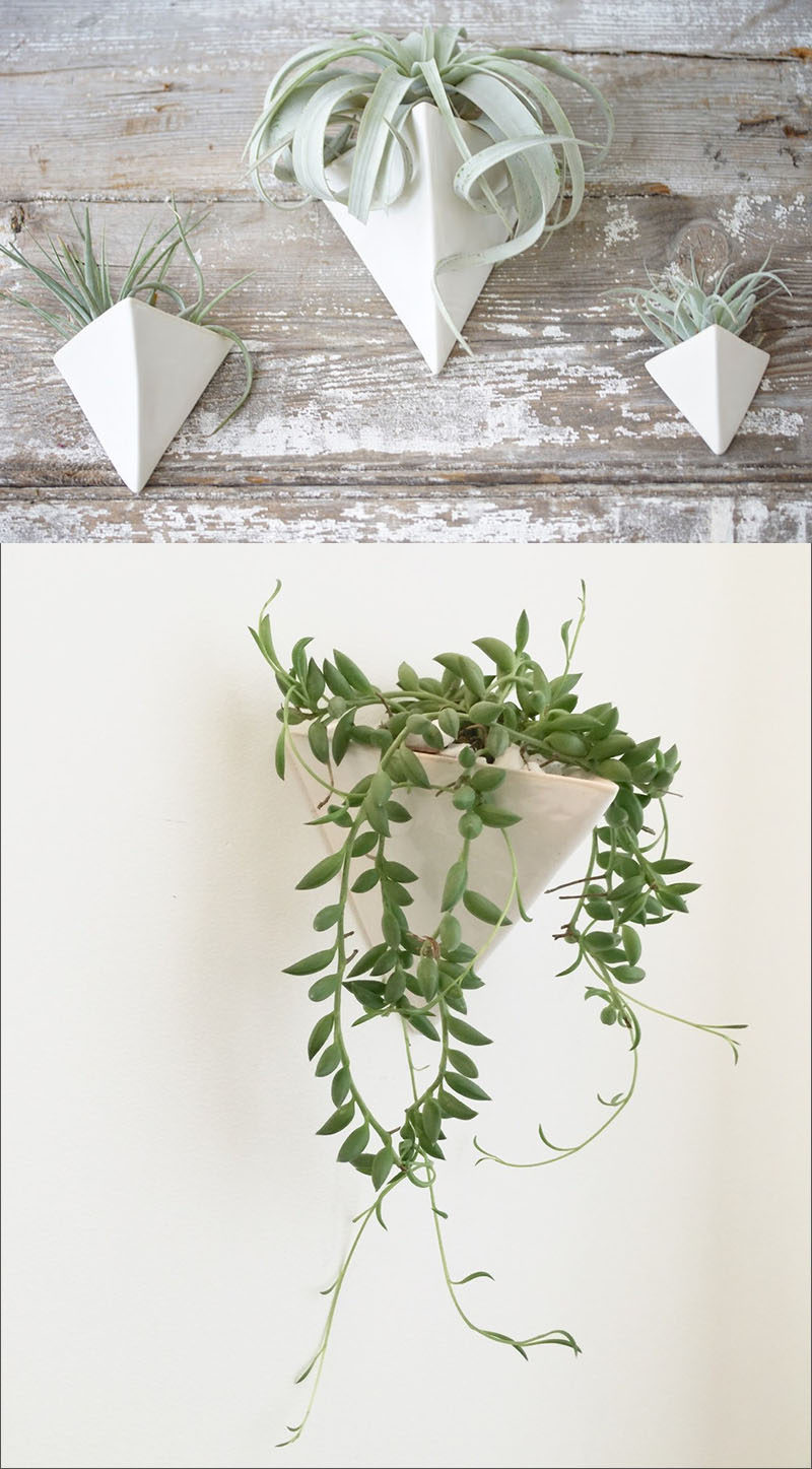 These unobtrusive, matte white, triangular plant holders mount onto the wall and create a cozy pocket for your plants to thrive in. #WallMountedPlanters #WallPlanters #Decor #HomeDecor #Plants #Gardening