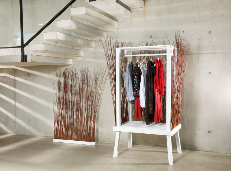 Paul Ketz has created a fun and unexpected design for a standalone closet (wardrobe), that uses willow branches to create the sides of the modern furniture piece.