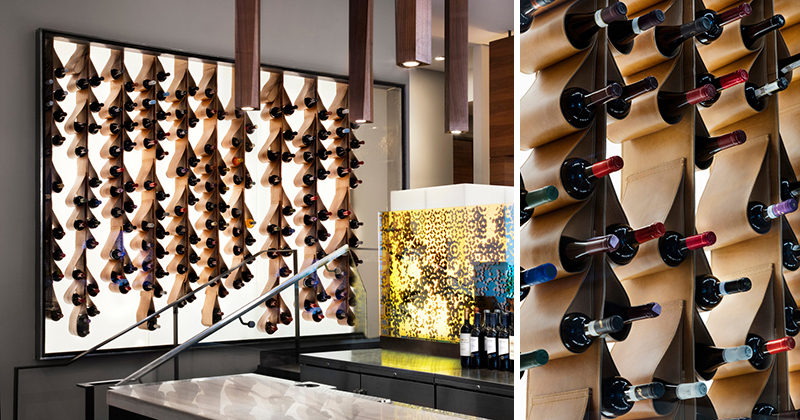 This renovated restaurant in Toronto, features a unique custom designed wine display made from leather that cradles the bottles of wine. It is also back lit and framed behind a glass wall, making it more like a piece of artwork than a storage solution.