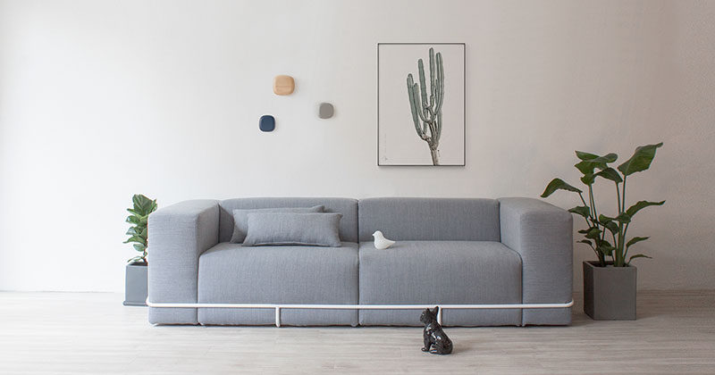 A Simple Metal Frame Contains The Six Cushions That Make Up This Sofa