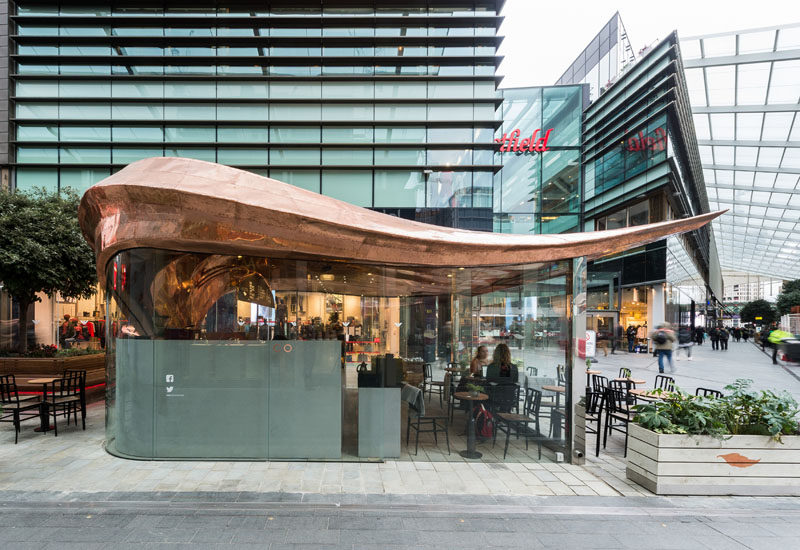 Architecture firm Mizzi Studio have designed Colicci, a new cafe in London, that features a leaf-inspired roof made from 542 individual laser cut copper sections that were attached by hand using traditional techniques and approximately 20,000 rivets.