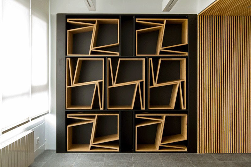 FLORES taller de arquitectura have design a pair of chairs that when stacked on top of each other they form a shape that can then neatly be stored away in a custom designed wall.
