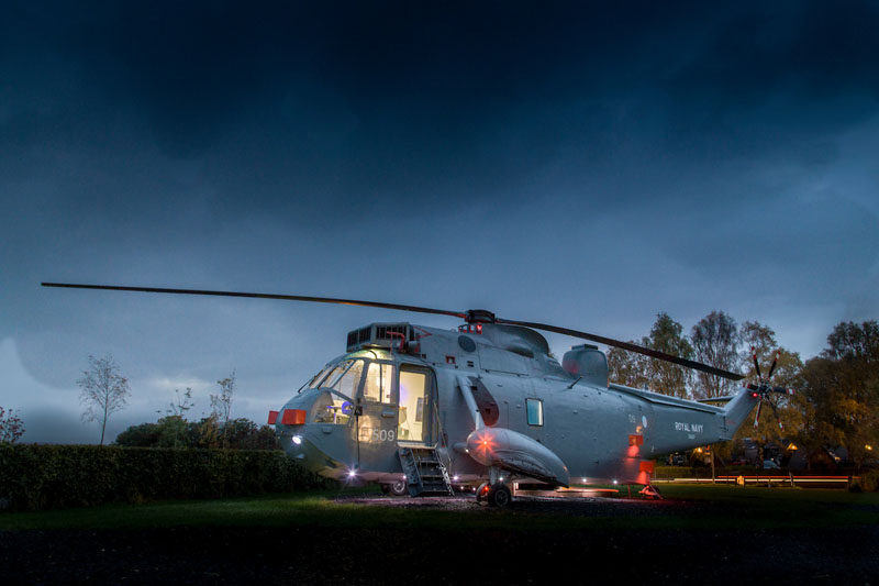 The team at Mains Farm in Stirling, Scotland, thought outside the box and invested in a decommissioned Royal Navy ZA127 Sea King Helicopter and turned it into a fun glamping destination, where you can sleep inside the helicopter.