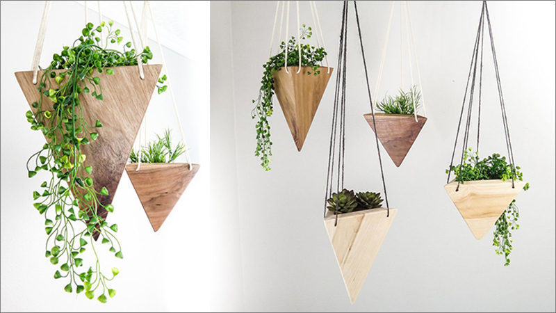 Fernweh Woodworking has created a collection of modern, geometric hanging wood planters, made from solid pieces of real wood.