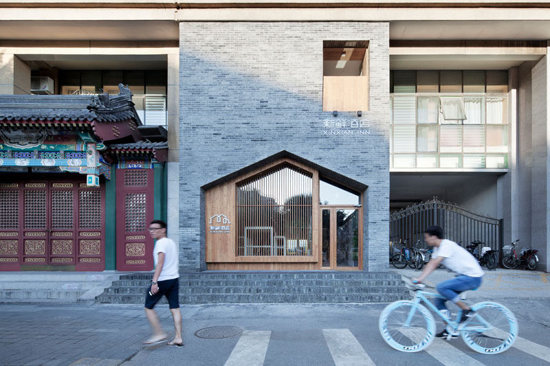 Gray Bricks And Wood, Work Together To Create A Contemporary Facade For This Small Hotel In Beijing