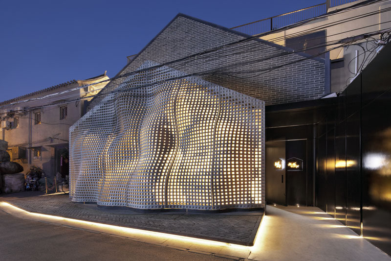 In Beijing, This Sculptural Concrete Facade Hides A Portrait Of Chairman Mao