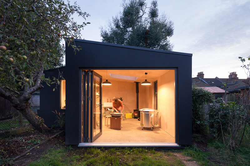 A Modern Pottery Shed Has Been Added To This British Backyard