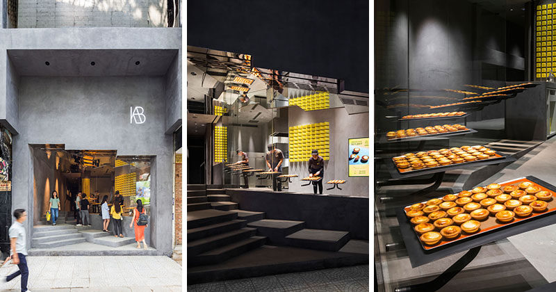 This modern bakery has a large concrete storefront with double height ceilings and a simple yellow and grey color palette, making the store stand out when compared to surrounding shops. #ModernBakery #StoreDesign #RetailDesign
