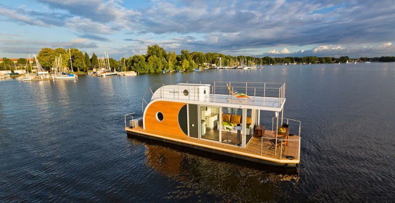 Nautilus Houseboats have designed 'Nautino Maxi', a modern houseboat that's large enough to sleep up to 6 people. #ModernHouseboat #Architecture #Design