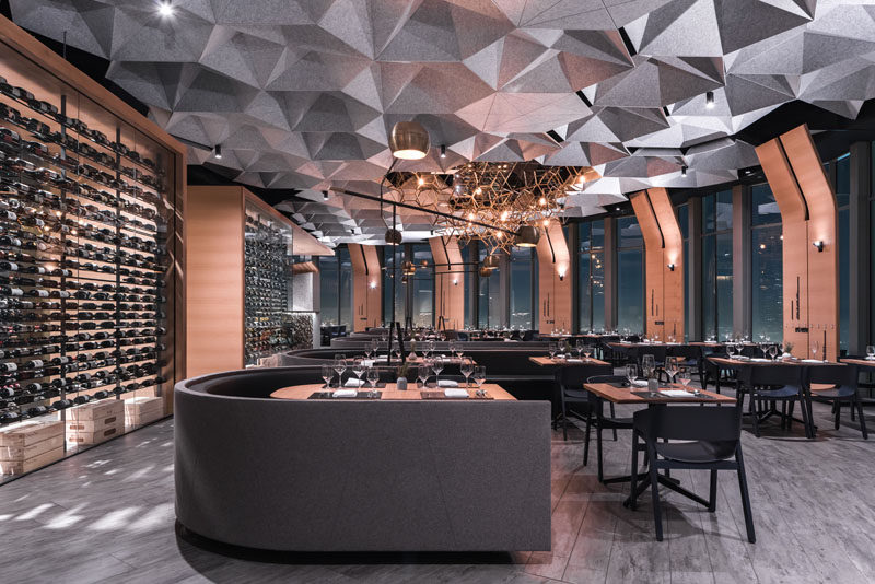 Hexagonally Shaped Ceiling Coffers Help Dampen Sound In This Restaurant