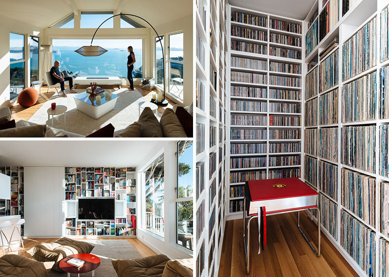 This modern house was transformed into a place to appreciate the home owners collections of vinyl records, design books, and vintage Coca-Cola bottles, while soaking in the ever-changing view. #LivingRoom #Bookshelves #Library