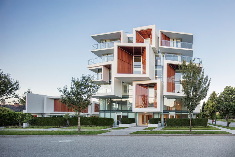 This New Building Features Wood That?s Been Framed Inside Glass Panels