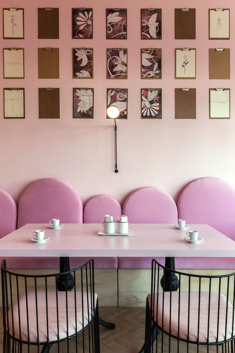 This modern patisserie has several clipboards where customers can draw or write whatever they want in these 'blank screens', which are then placed on display. #ModernCafe #Patisserie #InteriorDesign #Art #Pink