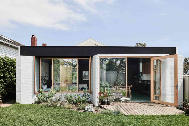 Taylor Knights Architecture & Interior Design have given a Californian bungalow home in Victoria, Australia, a new and modern 538 square foot (50sqm) addition that houses a living room, dining area and kitchen. #Architecture #HouseExtension #HouseAddition